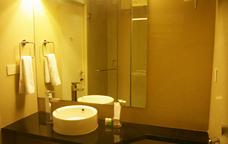 Roseline Suites - A Business Hotel - Lobby with reception team members